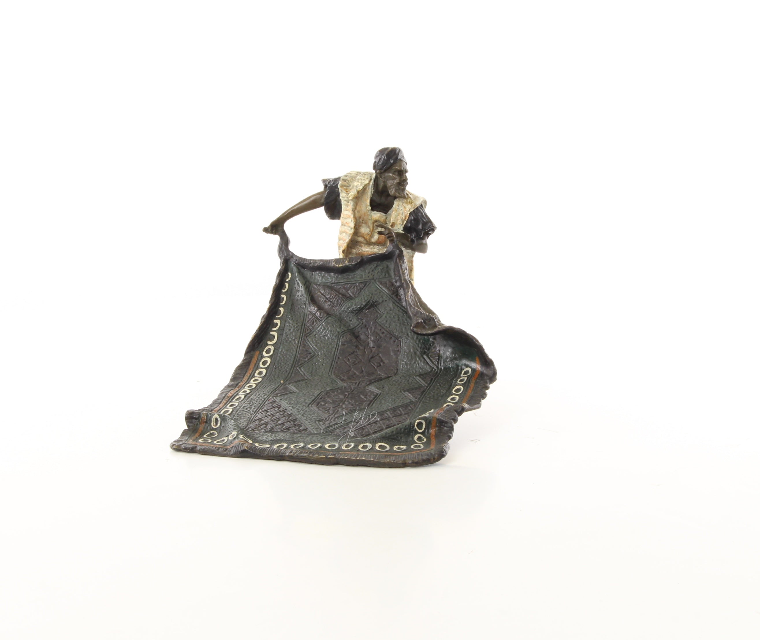 Bronzen tapijtverkoper sculptuur