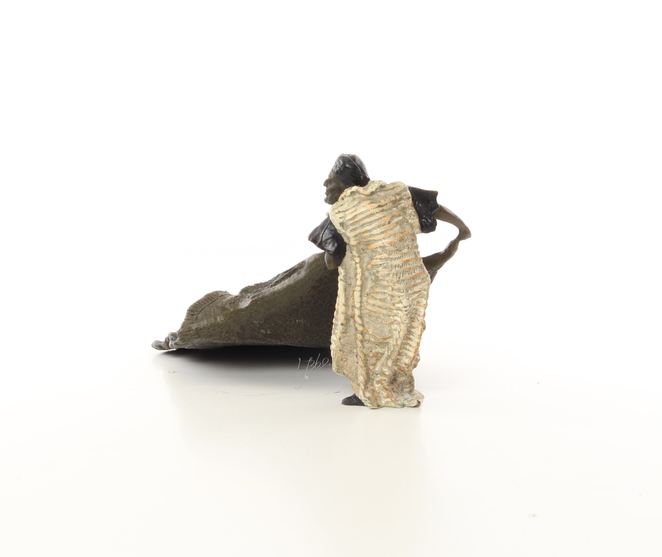 Bronzen tapijtverkoper sculptuur
