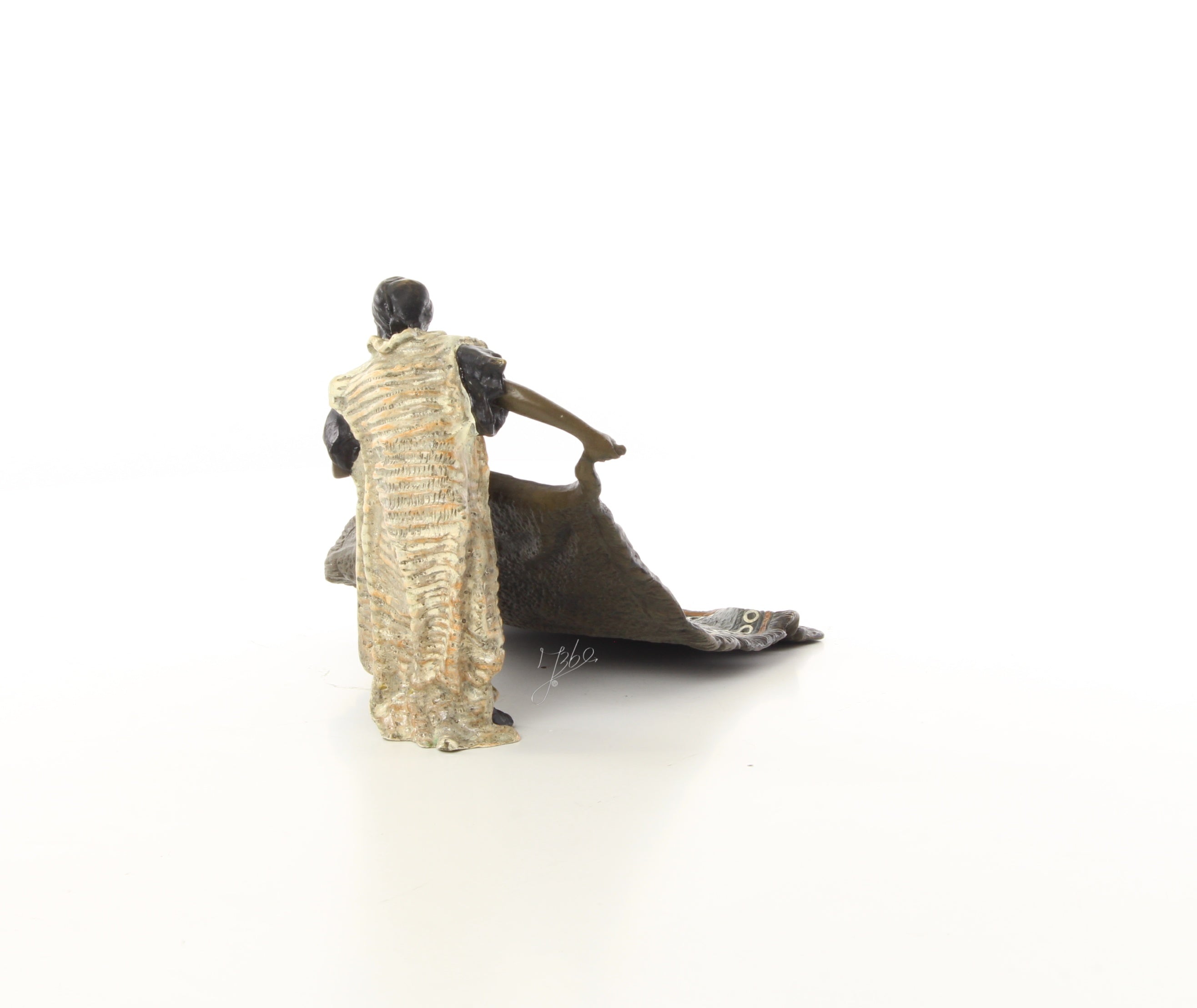 Bronzen tapijtverkoper sculptuur