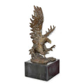 A BRONZE SCULPTURE OF AN EAGLE