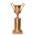 Neoklassieke bronzen urn met twee handgrepen op cilindrische zuilsokkel, goudkleurige patina – 41,9 cm